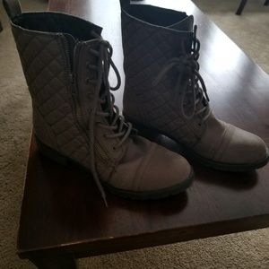 Grayish combat boots